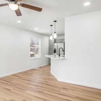 Method Home Renovations - an empty living room with a ceiling fan - General Contractors Near Me - Ann Arbor, Michigan