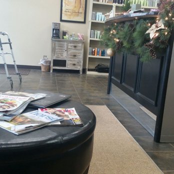 J. Estell Salon - Lobby has a comfy couch, few chairs, beverage station and take home product. I am enjoying the magazines! - Hair Salons Near Me - Louisville, Kentucky J. Estell Salon - Lobby has a comfy couch, few chairs, beverage station and take home product. I am enjoying the magazines! - Hair Salons Near Me - Louisville, Kentucky