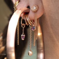 Ava Piercing Company - Stacked rings and charms