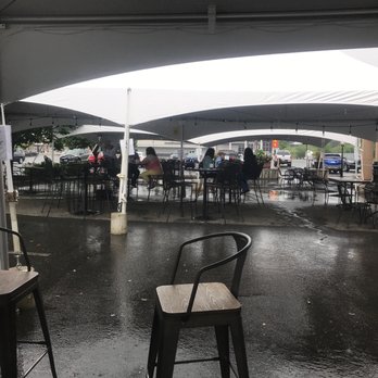 Wood N Tap - Our outdoor seating on this rainy last day of June, was comfortable and dry. - American Near Me - Wallingford, Connecticut Wood N Tap - Our outdoor seating on this rainy last day of June, was comfortable and dry. - American Near Me - Wallingford, Connecticut
