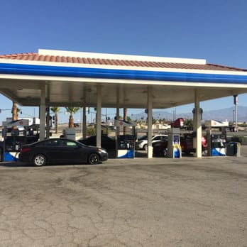 ampm - a gas station with cars parked in front of it - Convenience Stores Near Me - Thousand Palms, California