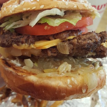 Five Guys - Trying to figure out how to eat it without making a mess. P.S. I failed. Lol. - Burgers Near Me - Champaign, Illinois