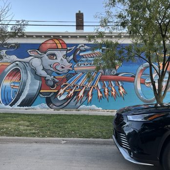 Sacred Cow Tavern - Cool mural exterior - Pubs Near Me - Cedar Rapids, Iowa