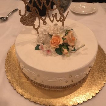 Celebrity Cakes - a wedding cake on a table - Custom Cakes Near Me - Tamarac, Florida