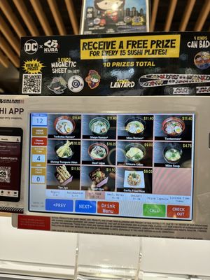 Kura Revolving Sushi Bar by null