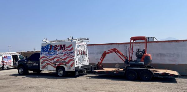 J & M Plumbing Heating & Air Conditioning Logo