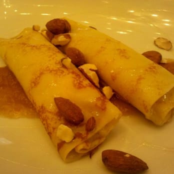 Nice Matin - RIcotta(?)stuffed crepes with honey and almonds - French Near Me - New York, New York Nice Matin - RIcotta(?)stuffed crepes with honey and almonds - French Near Me - New York, New York
