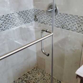 Quality Glass OC - Frameless glass shower door with outside horizontal bar to hang towel, and inside vertical handle. - Glass & Mirrors Near Me - Fullerton, California Quality Glass OC - Frameless glass shower door with outside horizontal bar to hang towel, and inside vertical handle. - Glass & Mirrors Near Me - Fullerton, California