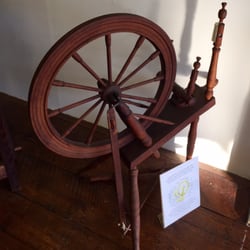 Museum Village - One of half a dozen types of spinning wheels on display.