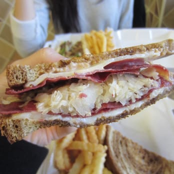 American Deli - Cross section of Reuben. - Chicken Wings Near Me - Atlanta, Georgia American Deli - Cross section of Reuben. - Chicken Wings Near Me - Atlanta, Georgia