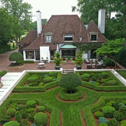 Green View - Crisp edging by our Maintenance crew for this formal landscape.