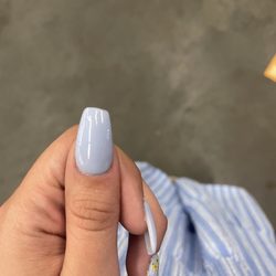 Lux Nails & Spa - Nails were not filed straight. Wish I had someone to show both of my thumbs because they look like 2 different nails.