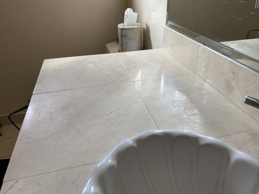 Marble countertop polishing - Although marble and other stones like travertine or limestone are delicate, they can be completely refinished and polished  just like new. 
Any product on the acidic side will and can leave etch marks if not properly sealed.