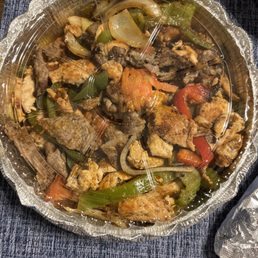 a bowl of chicken and vegetables a bowl of chicken and vegetables