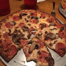 Cauliflower crust with pepperoni, beef and mushrooms. Cauliflower crust with pepperoni, beef and mushrooms.