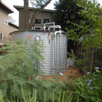 Innovative Water Solutions - 3,000 gallon Pioneer Water Tank in urban rainwater harvesting system used for irrigation water supply - Landscaping Near Me - Austin, Texas