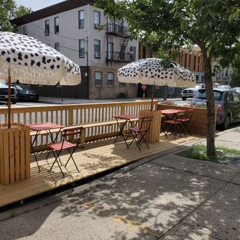 Lil' dove cafe - View of outdoor seating from the front of the cafe - Cafes Near Me - Jersey City, New Jersey Lil' dove cafe - View of outdoor seating from the front of the cafe - Cafes Near Me - Jersey City, New Jersey