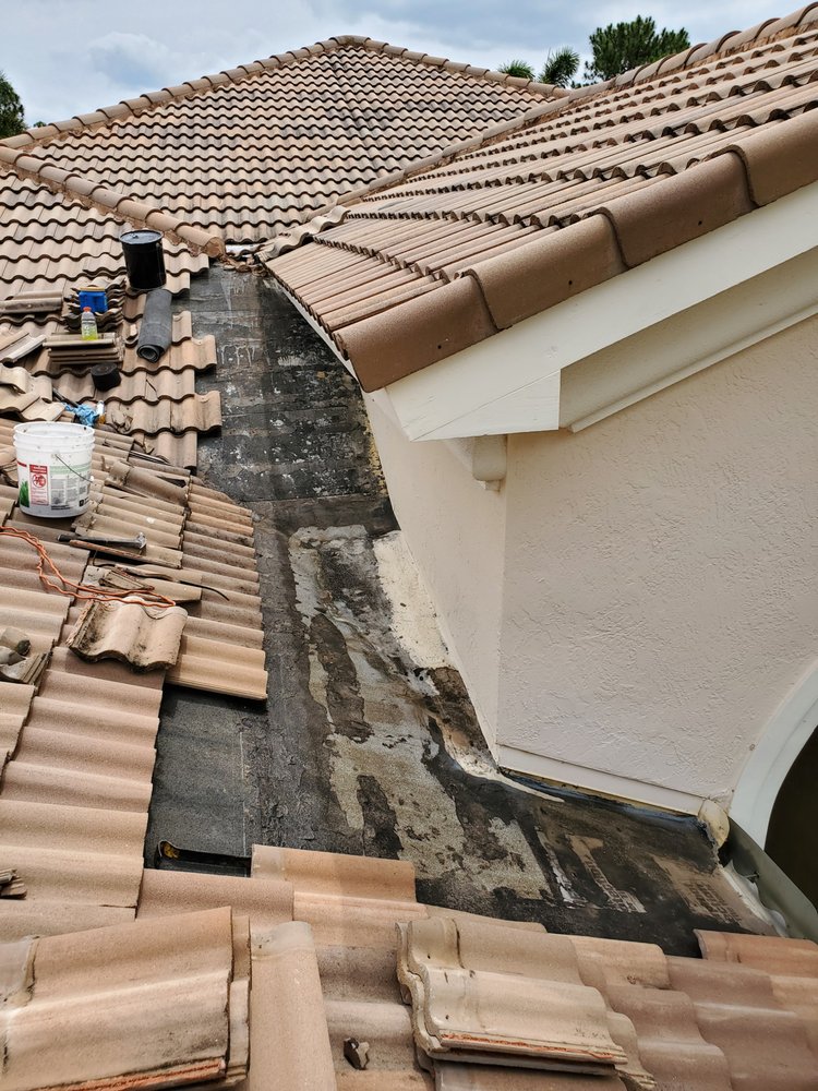 Slide of Rip Tide Roofing