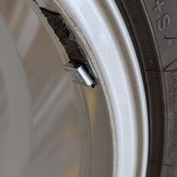 T & T Tire - Scratch from tie rod impact