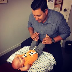 Hanson Family Chiropractic - Dr. Steve giving a adjustment to baby Liam!