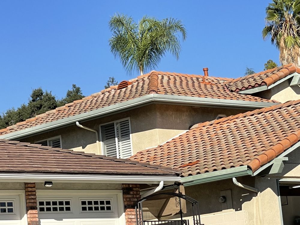 Slide of MRK Roofing Services