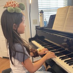 Anaheim Hills Piano Studio of Dr. Hoang Nguyen - Keeping good balance & adding arm weight