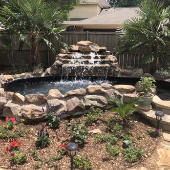 Elite Pools and Landscaping - a garden with a waterfall - Landscaping Near Me - Frisco, Texas Elite Pools and Landscaping - a garden with a waterfall - Landscaping Near Me - Frisco, Texas