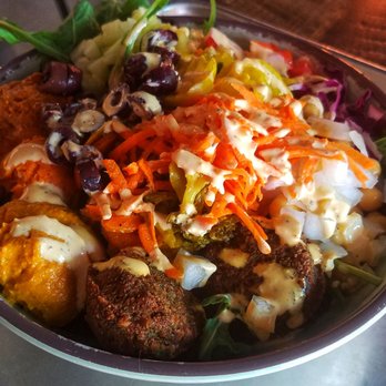 Rice Mediterranean Kitchen - Greens and grains bowl with falafel and roasted veggies - Mediterranean Near Me - Coral Gables, Florida Rice Mediterranean Kitchen - Greens and grains bowl with falafel and roasted veggies - Mediterranean Near Me - Coral Gables, Florida