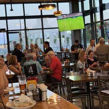 District Pour Haus - Sports Bars Near Me - Ashwaubenon, Wisconsin District Pour Haus - Sports Bars Near Me - Ashwaubenon, Wisconsin