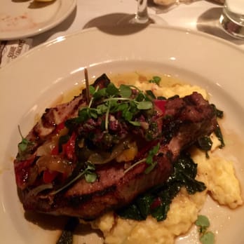 Old Ebbitt Grill - Pork Chop atop Grits and Braised Chard - Bars Near Me - Washington, DC, District of Columbia Old Ebbitt Grill - Pork Chop atop Grits and Braised Chard - Bars Near Me - Washington, DC, District of Columbia