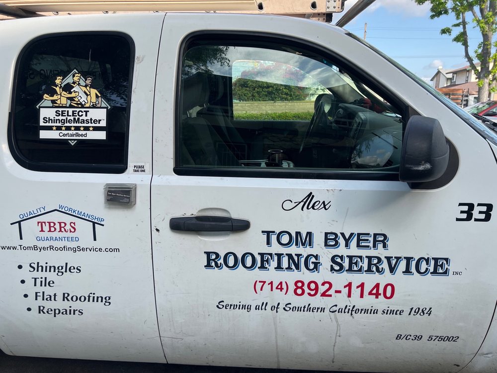 Slide of Tom Byer Roofing Service