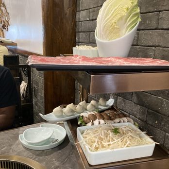Chengdu Memory - Our hotpot choices- mushrooms, pork belly, roe filled fish balls, cabbage, sprouts & udon - Hot Pot Near Me - Seattle, Washington Chengdu Memory - Our hotpot choices- mushrooms, pork belly, roe filled fish balls, cabbage, sprouts & udon - Hot Pot Near Me - Seattle, Washington