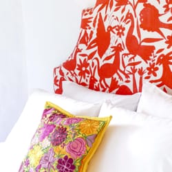 La Bohemia Baja Hotel Pequeño - Beautiful headboards handcrafted from embroidered Mexican blankets.