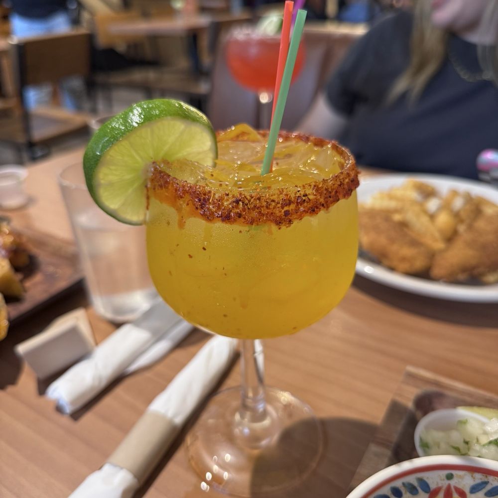 Flora Cafe - Mango Margarita with tajín rim - Cafes Near Me - Omaha, Nebraska Flora Cafe - Mango Margarita with tajín rim - Cafes Near Me - Omaha, Nebraska