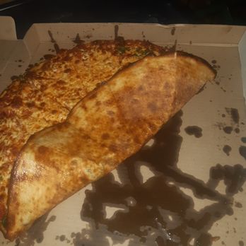 King Slice - Oil stain is from herbal/garlic-oil condiment. - Pizza Near Me - Toronto, Ontario