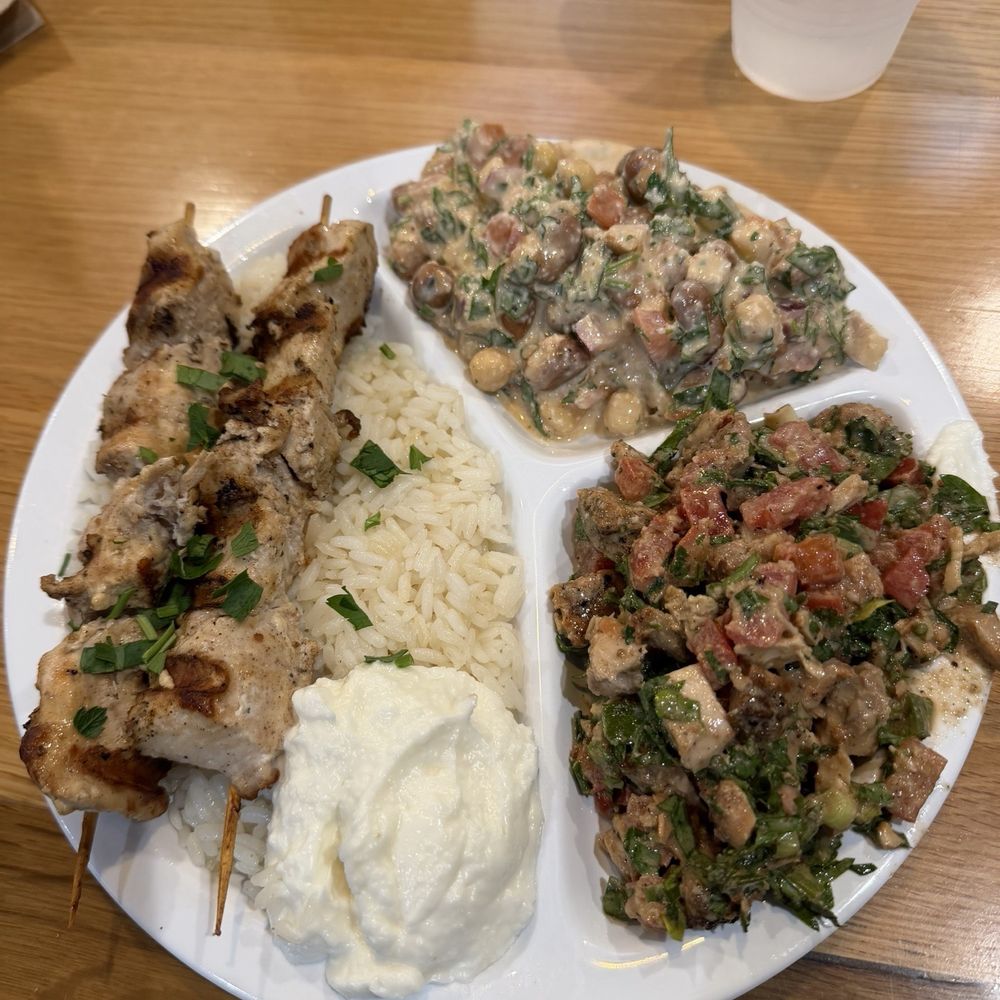 Sassool - Chicken kebab, fava bean salad, Mediterranean chicken salad (clockwise) - Mediterranean Near Me - Cary, North Carolina Sassool - Chicken kebab, fava bean salad, Mediterranean chicken salad (clockwise) - Mediterranean Near Me - Cary, North Carolina