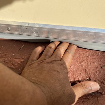 Bayside Pest Elimination - This is the exterior door sweep that he installed. As you can see rubberized bottom and leaves enough access for my hand AND RATS - Pest Control Near Me Bayside Pest Elimination - This is the exterior door sweep that he installed. As you can see rubberized bottom and leaves enough access for my hand AND RATS - Pest Control Near Me