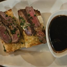 Fat and gristle are the highlight of this starter at Joey's.  Served cold so the fat is sickening congealed. $13