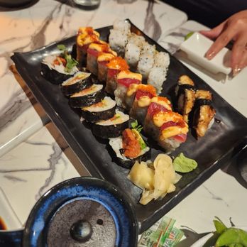 Shoga Sushi Bar - Philly roll, spicy tuna and a specialty roll I can't remember the name of. ( it had ahi tuna on top) - Sushi Bars Near Me - Orem, Utah