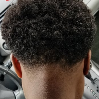 Faded Out Cutz - The back after the barber tried removing the star he cut without asking. - Barbers Near Me - Queens, New York