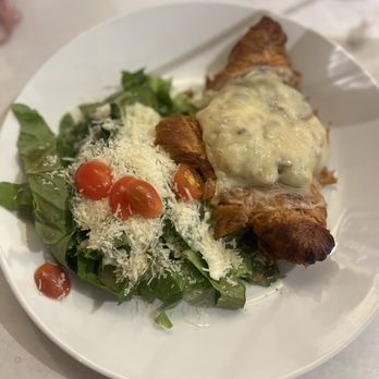 French Crust Cafe and Bistro - Flat croissant with side of Caesar salad. - Breakfast & Brunch Near Me - Cincinnati, Ohio French Crust Cafe and Bistro - Flat croissant with side of Caesar salad. - Breakfast & Brunch Near Me - Cincinnati, Ohio