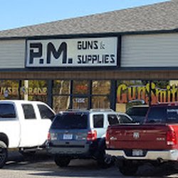 P.M. Guns & Supplies - Store front at HWY 287 and Carpenter Road