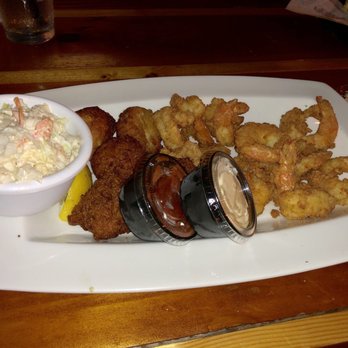 Caps On The Water - Fried mayport shrimp with hush puppies and slaw. - Seafood Near Me - St Augustine, Florida Caps On The Water - Fried mayport shrimp with hush puppies and slaw. - Seafood Near Me - St Augustine, Florida