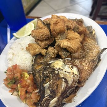 El Bucanero - Mojarra Chicharron - the meat of the tilapia fish with rice and salad very tasty - Mexican Near Me - San Antonio, Texas El Bucanero - Mojarra Chicharron - the meat of the tilapia fish with rice and salad very tasty - Mexican Near Me - San Antonio, Texas