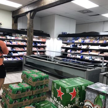 Bloomingdale Latin Market - a man shopping in a grocery store - Grocery Near Me - Brandon, Florida