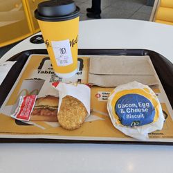 My large hot coffee, Bacon Egg and Cheese biscuit with hash browns
