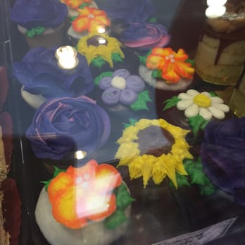 Sugar Twist Bakery - Pretty flower cupcakes (and message cookies available too) for Mother's Day 2015. - Donuts Near Me - Bakersfield, California Sugar Twist Bakery - Pretty flower cupcakes (and message cookies available too) for Mother's Day 2015. - Donuts Near Me - Bakersfield, California