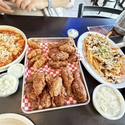 Tteokbokki , Bulgogi fries, and the Seoul Sampler Tteokbokki , Bulgogi fries, and the Seoul Sampler