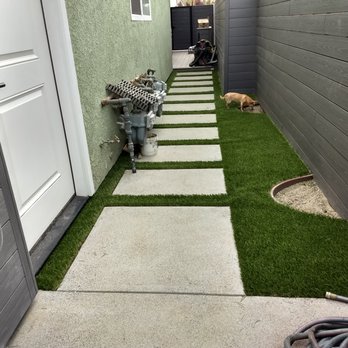 Hartscape Company - After Gary and Hartscape saved the day. That's Muggy our chihuahua sniffing the new planter. - Landscaping Near Me Hartscape Company - After Gary and Hartscape saved the day. That's Muggy our chihuahua sniffing the new planter. - Landscaping Near Me