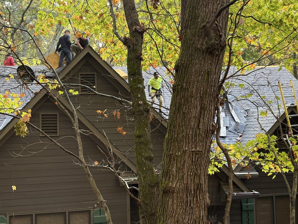 Slide of SharpTop Roofing